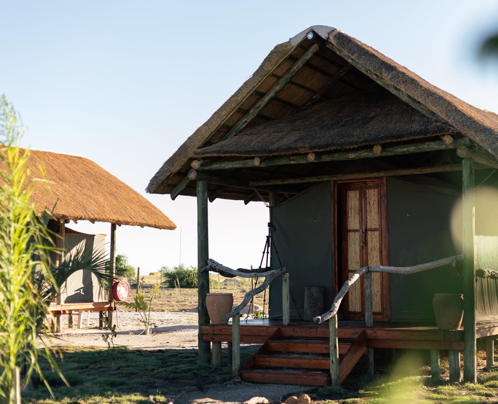 A tented room on wooden decking at Munga Plains
